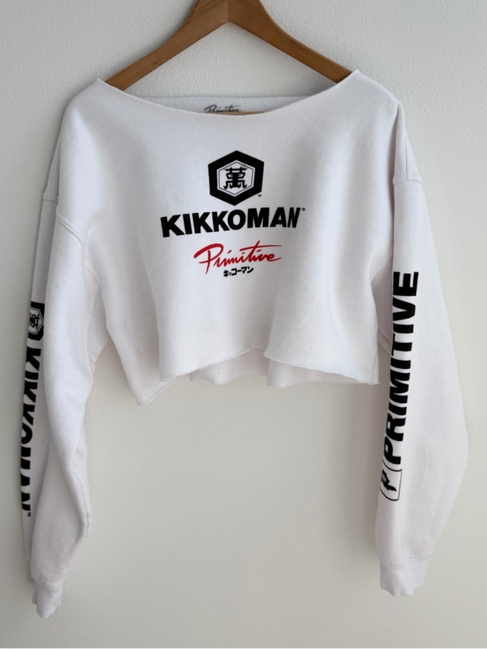 Primitive x Kikkoman white cropped off the shoulder sweatshirt